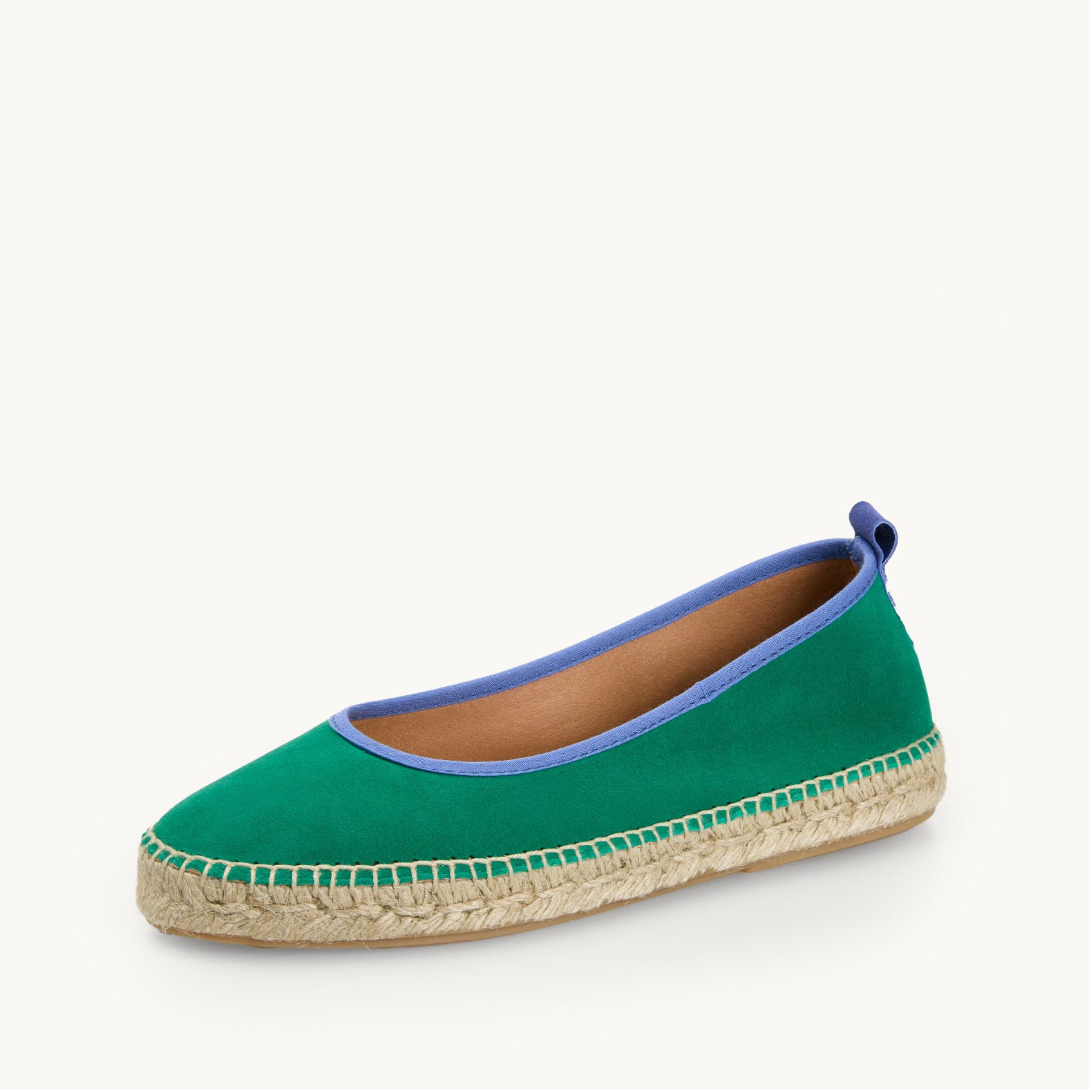 One women's ballet espadrille, flat shoe. Green suede with blue trim around the opening with stitching around the edge joining the top to the a traditional jute sole.